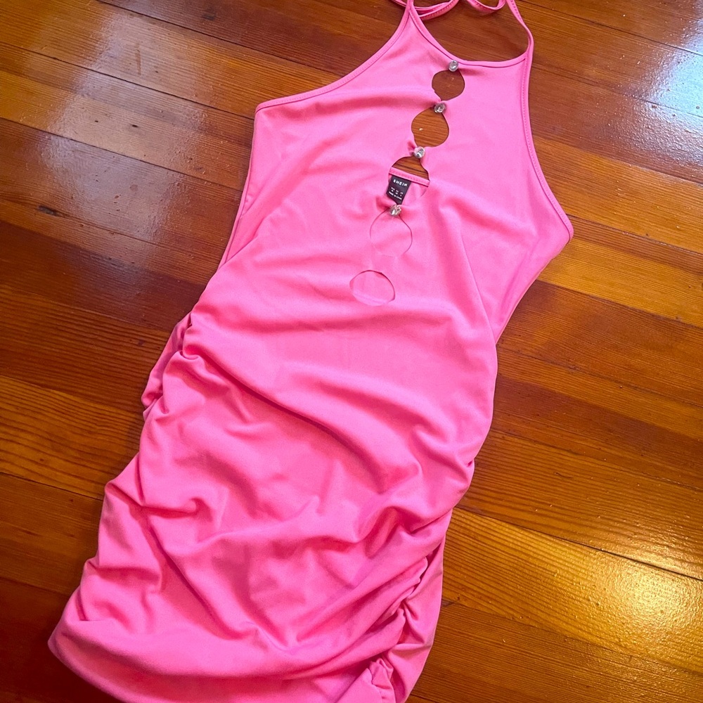 Pink bodycon mini dress with cut outs and rhinestones